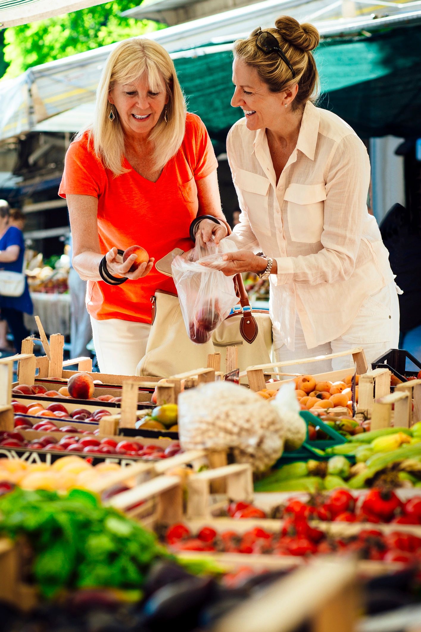 Customers shopping at a market stall